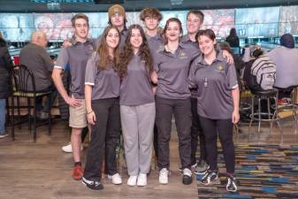Front row from left are Cassidy Kunz, Colleen Janetzko, Serena Kunz and Maxine Kunz and back row from left are Michael McCloskey, Michael Snyder, Vinny Janetzko and Matt Strianse, all members of the West Milford bowling team. (Photo by Lors Photography)