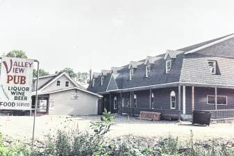 A 1991 photo shows the Bearfort Lodge and behind it the newly built Valley View Pub that opened that year.