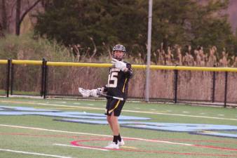 West Milford's Aidan Bolger holds up two fingers signifying the 2 goals he scored in the game.