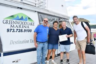 Congressman Josh Gottheimer stands with the folks at the Greenwood Lake Marina in Hewitt.