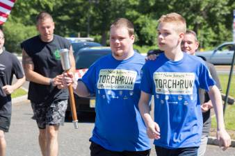 Local athlete carries Torch