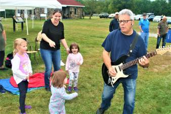 [Music filled the air Saturday at the Wallisch Homestead Music Festival. Charles Kim photo]