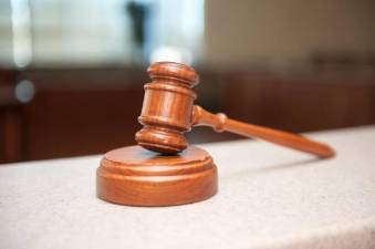 Guilty plea in stabbing death