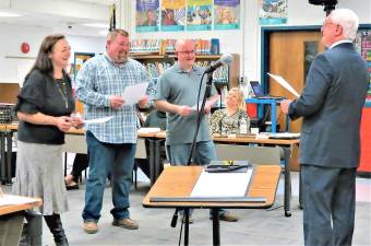 From left to right, Cortney Stephenson, Jaycen Stillman, and Michael Conklin are sworn into office Tuesday night.