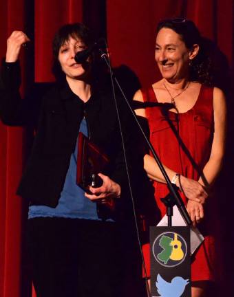 Photo courtesy Mike Del Vecchio Loretta Hagen, left, accepts her Jersey Acoustic Music Award from Deena Shoshkes at the awards ceremony on Sunday. Hagen is from West Milford.