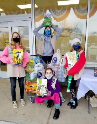 When the pandemic hit and people lost their jobs, the girls in Troop 96516 saw how much local food pantries were being used. And then they thought: What about the pets? Photos provided by Kimberly Tolnai.