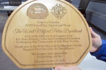 This plaque acknowledging the efforts of the West Milford Police Department was presented at a special Township of West Milford council meeting by Our Lady Queen of Peace Knights of Columbus Council 6139. Photos by Ann Genader.