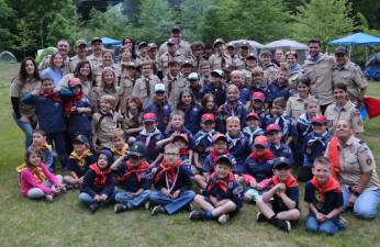 Members of Cub Scouts Pack 9 and their families pose during the family campout June 3. (Photo by Nicki Jones)