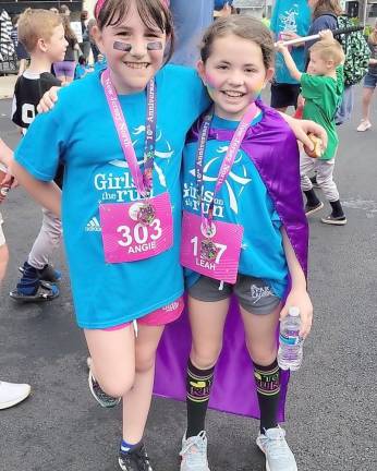 GOTR runners Angie Szabo and Leah Selander are proud of their accomplishment.