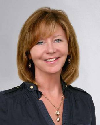 Linda Mccullough earns annual sales production award