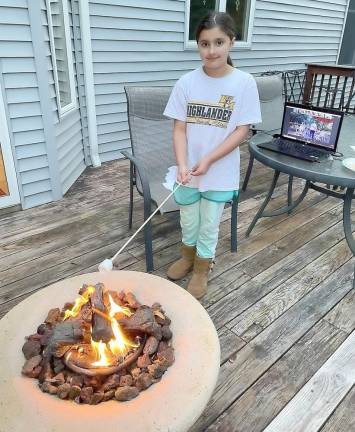 West Milford. WM Girl Scouts gather for a virtual campfire