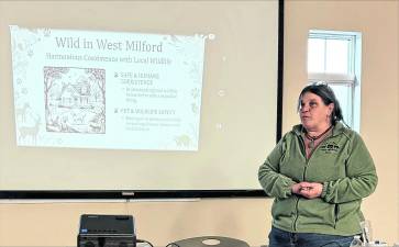 Nancy Walker, president of The Last Resort Wildlife Refuge gives a presentation at the West Milford Library.