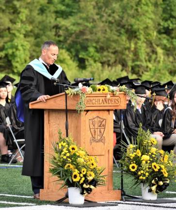 Superintendent Alex Anemone praises the graduates for their determination and grit.