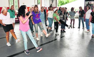 Participants dance.