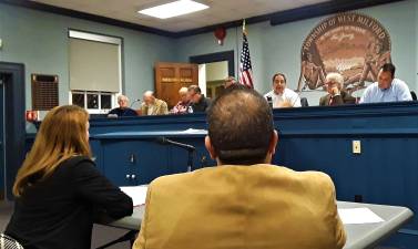 Charles Kim photo Planning Board Chairman Andrew Gargano responds to board member and Township Councilman Lou Signorino during a discussion of a draft Airbnb ordinance at the Oct. 25 meeting.