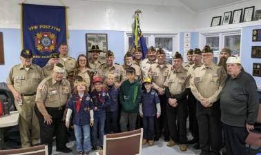 Members of Apshawa Cub Scout Pack 139 visited members of Veterans of Foreign Wars Post 7198 to thank them for their service with hot cocoa, refreshments and some joke telling. (Photo provided)