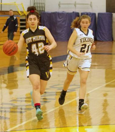 West Milford's Ashley Jacobs handles the ball in the third quarter. Jacobs scored 12 points.