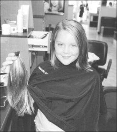 Proudly donating her hair