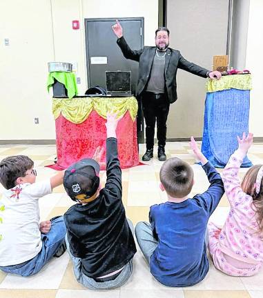 Mr. Magico performs.