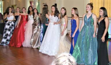 A dozen local volunteers from Abby's Sew Right in Hewitt modeled the latest in fashion during the Girl Boss Expo in Goshen on Sunday.