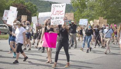 The march organized by West Milford High School junior Sarah Chandler on Thursday, June 4, attracted more than 300 people.