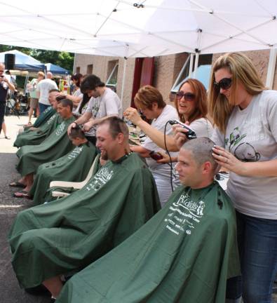 Six chairs, no waiting. Saint Baldrick's Foundation - WMPD/WMFD Conquer Cancer fund raising event on Sunday, 6/1/12 at the Macopin firehouse in West Milford. All funds go to children's cancer research. Photo by Ginny Raue