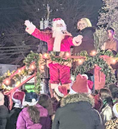 Santa Claus speaks before the tree lighting.