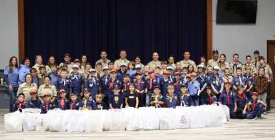 The Cub Scouts of Pack 9 collected enough food to provide full Thanksgiving meals for 65 families. (Photo provided)