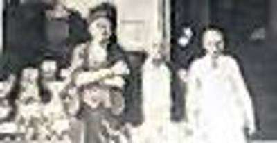 Arthur Olden, born in 1890, is seen in front of his Great Eastern Grocery Store in Hewitt. Gus Herman is at left. The man in center is only identified as Tom.