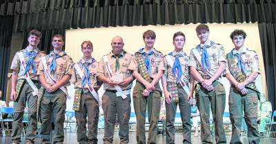 Scoutmaster Jimmy DaSilva, center is shown with Troop 151’s seven near Eagle Scouts.