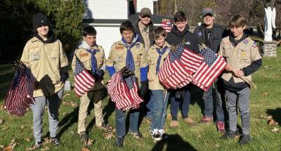 Over the weekend Boy Scouts from Troop 114 placed American Flags on the graves of veterans interred in St. Joseph’s Cemetery on Germantown Road. Photo provided by Bret Harmen.
