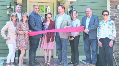 Officials cut the ribbon.