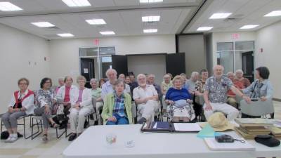 Members of the International Friendship Club of North Jersey meet at the West Milford library. The group recently celebrated its 20th anniversary. (Photo by Ann Genader)