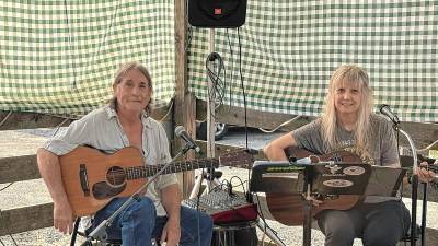 Pam LeGall and John Sheehan perform Saturday morning at the Vreeland Store’s Summer Festival. (Photo courtesy of Pam LeGall)