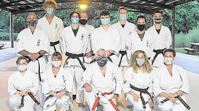 Pictured in the back row (from left): Scott Riley, Cody Williams, Zachary Trost, Kevin Noah, Christopher Carrisco, Paul Doumanis Jr., Nick Vigiletti, and Tyler Douglass; front row: Rachel Olinski, Monica Rolando, Sensei Tom Shull, Juliann Vigiletti, and Sacha Dorsey (missing is Taylor Schoenfeld). (Photo provided)