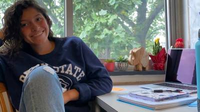 Isabella Granada at the desk in her Penn State dorm room (Photo provided)