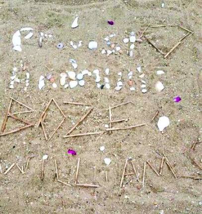 Sand art by Kathryn Keller, Emma Jaworski &amp;and Jean Huang says "Provost, Andriulli, Boze &amp; Williams"- the Diamond Cluster teachers' names.