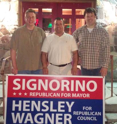 From left, Tim Wagner, Lou Signorino and Mike Hensley celebrate after their primary victory on Tuesday night.