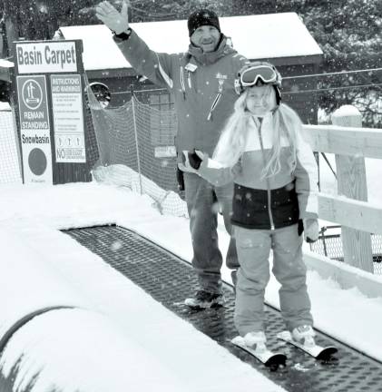 Photos provided by Carol Fauerbach-Forshay Robert Gallo, Mountain School director and Hailey Richardson take the first carpet ride on the new liift "Basin Carpet."