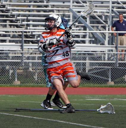 Brendan Pick scored his 100th goal for the Highlanders boys lacrosse team. He is the first in the program's short history.