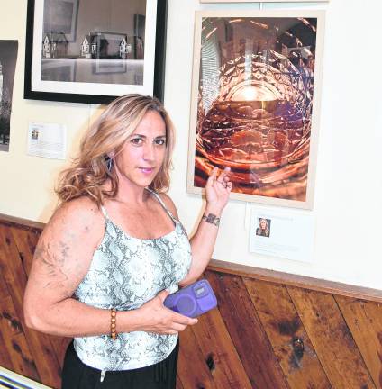Debbie Weber McCollum of Oak Ridge shows her artwork.
