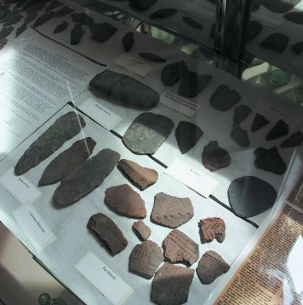 Lenni-Lenape Native American relic display; spear points, pot shards, stone drill, ornatments, scrapers. West Milford Museum. Photo by Ginny Raue