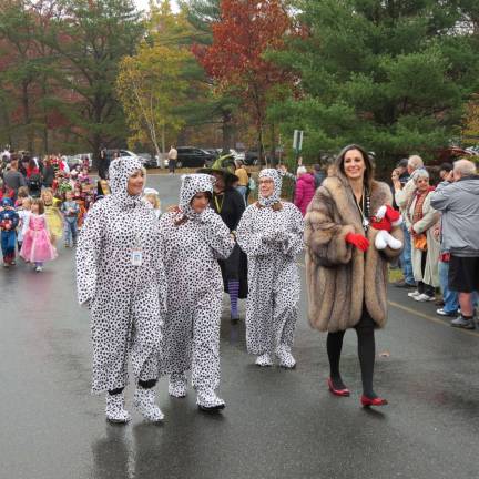 Principal Jennifer Miller put on her best Cruella DeVille, along with her dalmations in tow.