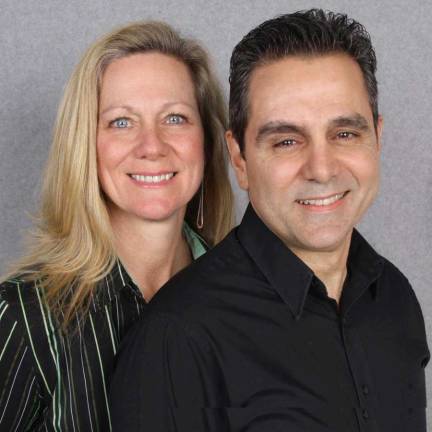 Leslie Anderson and Dennis Decina of RE/MAX Country Realty were awarded an award of excellence.