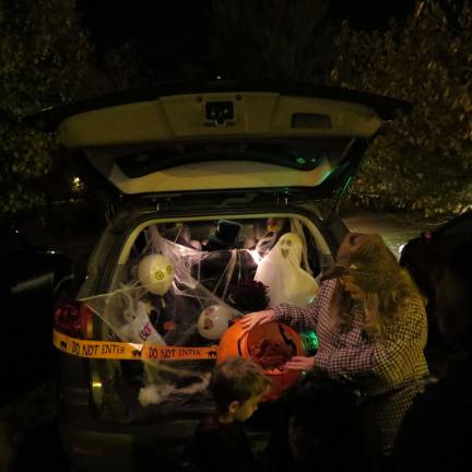 Families went all out with their trunk or treat decorations.