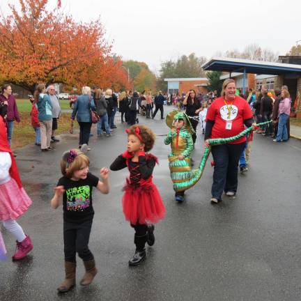 The parade is a much-anticipated event at Paradise Knoll, with parents, grandparents and siblings lining up to see the costumes.