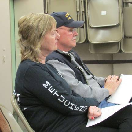 Photo by Ann Genader Nancy E. Jessen, owner of South Shore Marina, and Pat Sarnella, representative of Greenbrook Estates Property Owners Association, are at a Greenwood Lake Commission meeting for information about status of the lake drawdown.