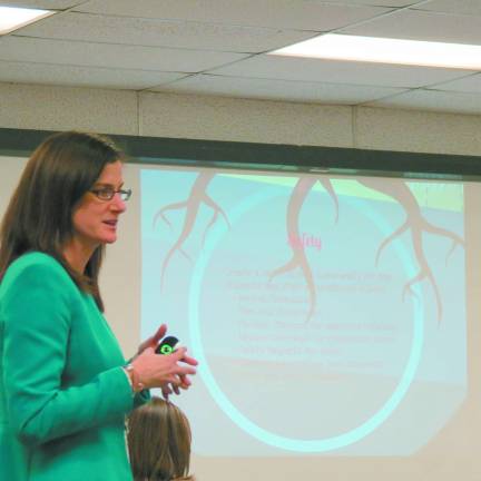 Siobhan Taubert, principal of Westbrook Elementary School, presents her plan.