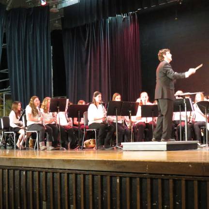 The seventh grade band performed several holiday songs.