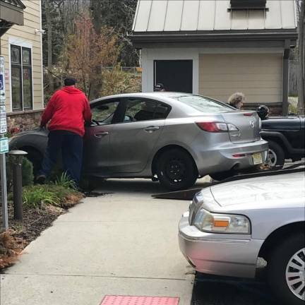 A driver accidentally jumped the curb at West Milford Library.